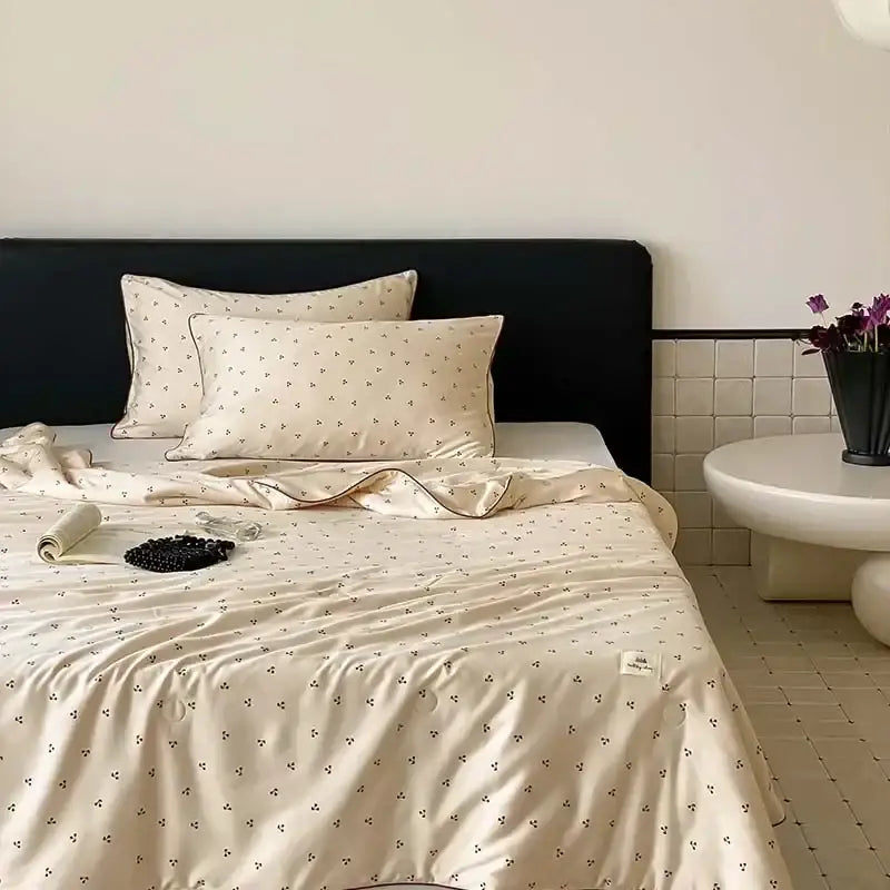 Cream-colored satin duvet cover with delicate black floral embroidery for decorbites cherry lyocell fiber cooling blanket