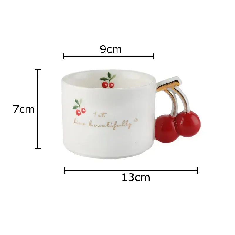 White ceramic cherry pattern porcelain coffee mug with gilded edge and red cherry handle for tea and juice