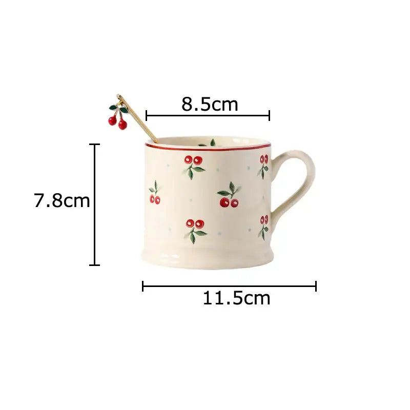 Cream-colored DecorBites™ cherry pattern porcelain coffee mug with lovely cherry and green leaf design for afternoon tea