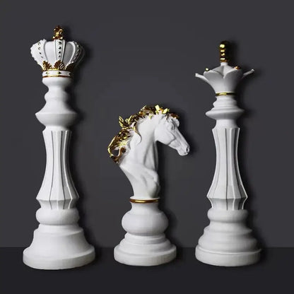 White chess pieces figurines with gold accents including king queen and knight by DecorBites chess for home decor