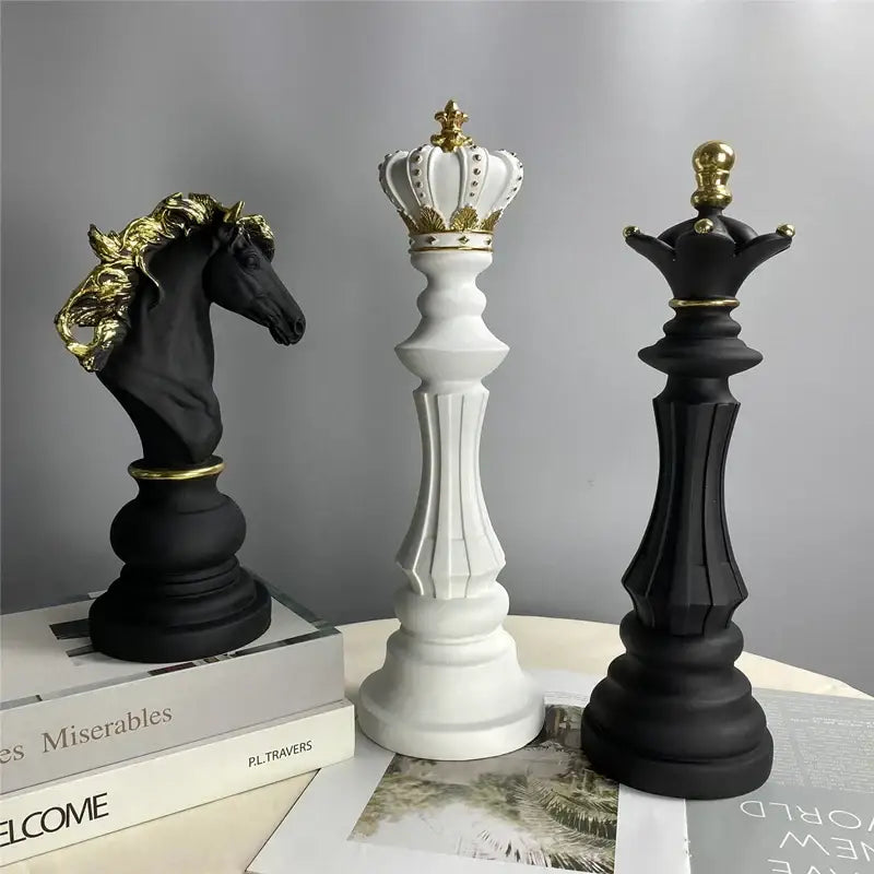 Decorbites chess pieces figurines featuring black and white designs with gold accents for home and office decor