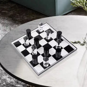 Decorbites chessboard desk ornament with black and silver glossy cylindrical pieces on mirrored chessboard for desk decor