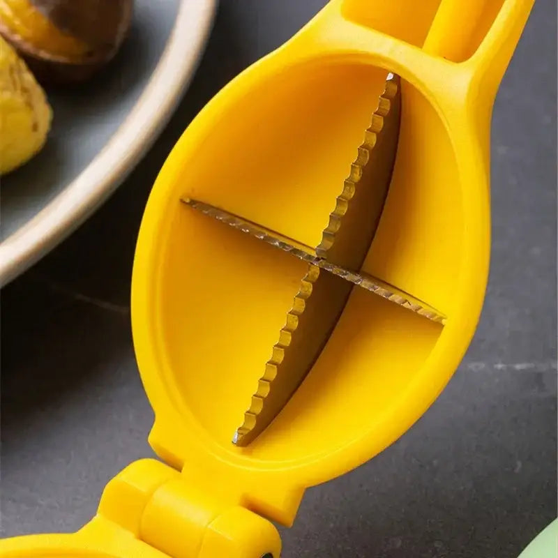 Bright yellow plastic decorbites chestnut clip nutcracker with metallic serrated blade for shelling nuts