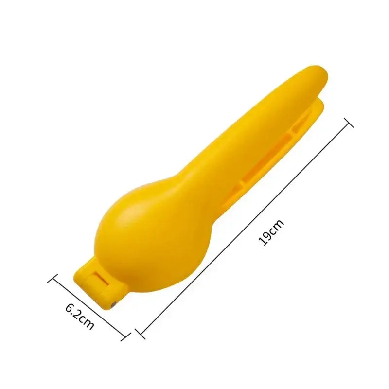 Bright yellow plastic citrus juicer with sleek ergonomic design featured with decorbites chestnut clip nutcracker