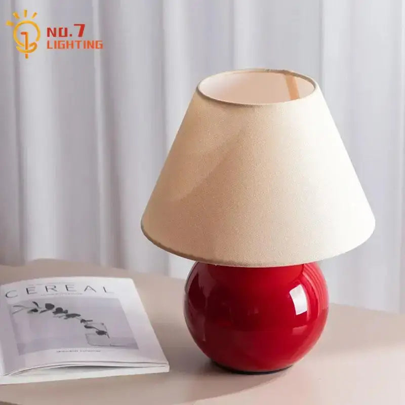Decorbites chestnut glass red ceramic table lamp with beige fabric shade for bedroom and living room use