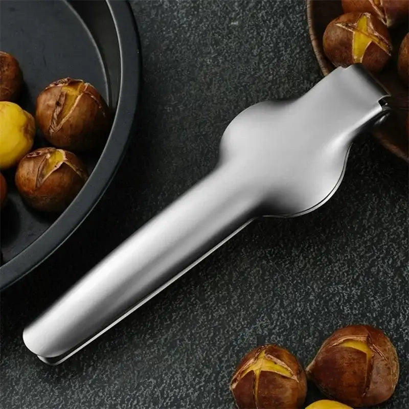 A sleek stainless steel decorbites chestnut opener with polished finish and ergonomic handle for quick clipping and cracking