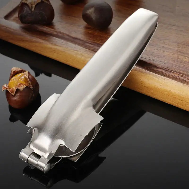 Shiny stainless steel decorbites chestnut opener with sleek ergonomic design for cracking nuts and shells