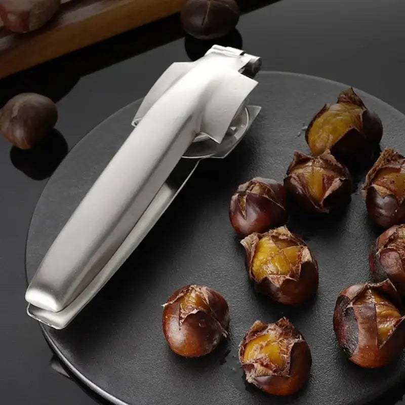 Shiny silver stainless steel decorbites chestnut opener with sleek modern design for cracking nuts efficiently