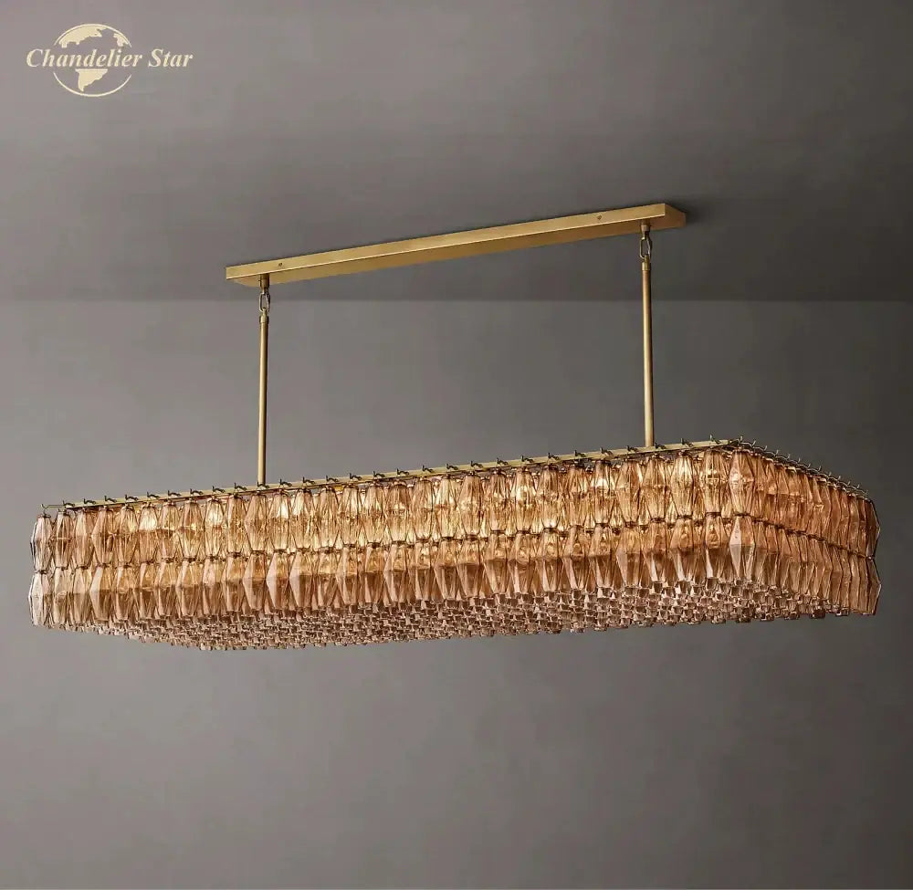 Gold-toned rectangular decorbites chiara smoke glass linear chandelier with cascading amber crystal prisms for dining and living room