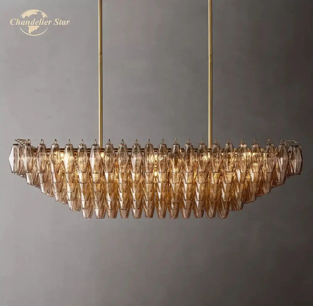 Gold-toned decorbites chiara smoke tiered chandelier with faceted amber smoke glass shades and brass hardware