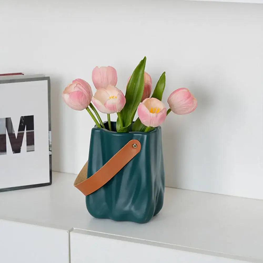 Teal ceramic vase with brown leather strap from decorbites™ chic ceramic vase collection for home decoration