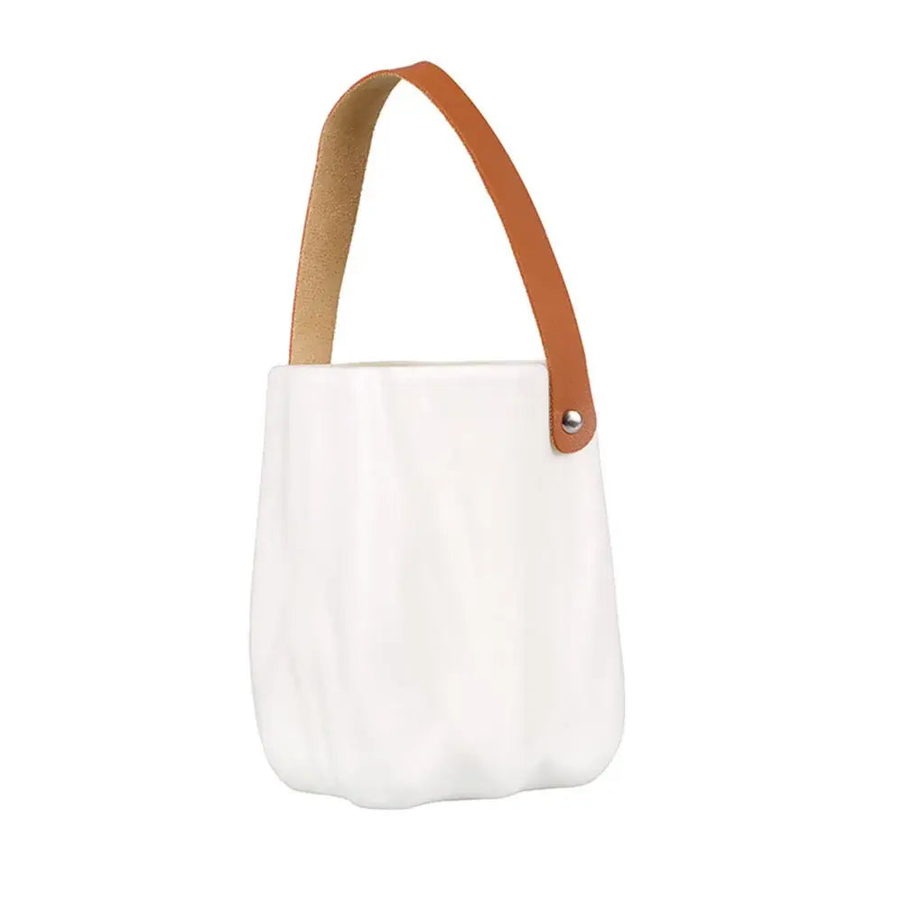 White ceramic vase with tan leather handle by decorbites chic ceramic vase for home decoration