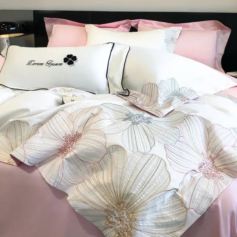 White satin duvet cover with large beige pink and silver floral embroidery in decorbites chic embroidered cotton bedding set