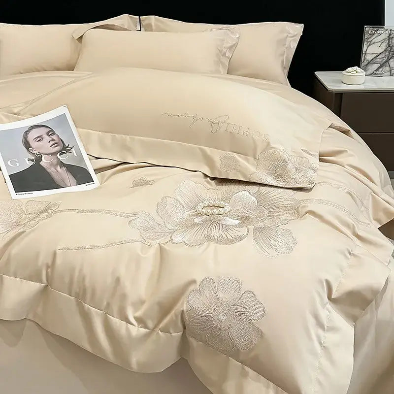 Cream-colored cream-colored satin duvet cover bedding set with silver thread floral embroidery and pearl accents by decorbites chic embroidered cotton