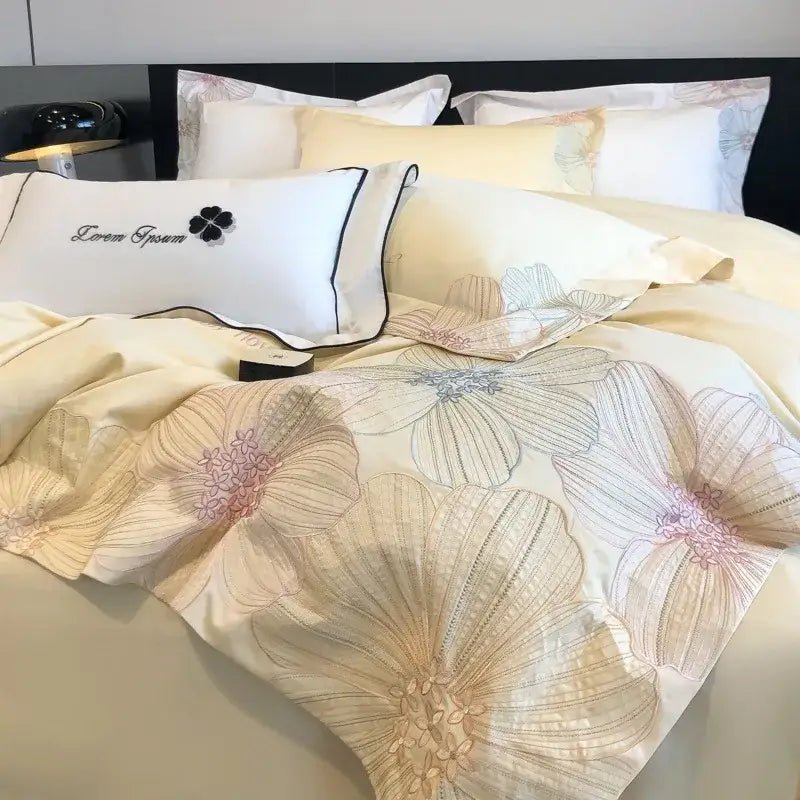 Cream-colored satin decorbites chic embroidered cotton bedding set with floral embroidery and love you pillow sham