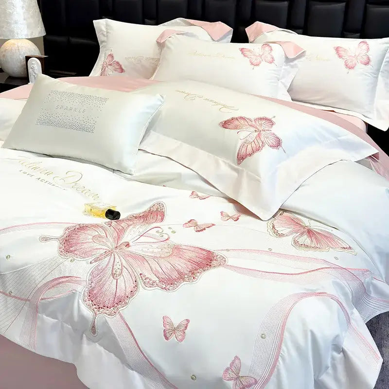 White satin bedding set with delicate pink butterfly embroidery and shimmering details in decorbites chic embroidered cotton