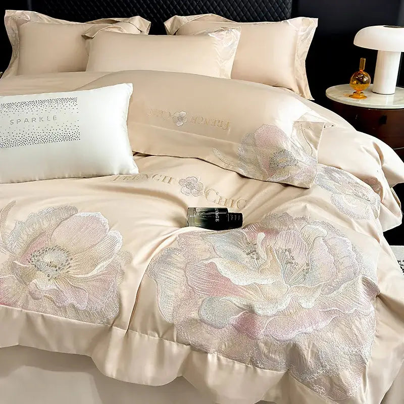 Beige satin duvet cover with delicate pink and silver floral embroidery from decorbites chic embroidered cotton bedding set