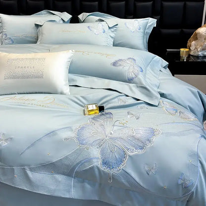 Light blue satin bedding set with intricate butterfly embroidery in silver and gold thread by decorbites chic embroidered cotton