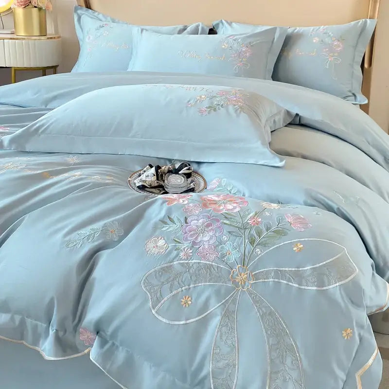 Light blue 100% cotton DecorBites chic flowers embroidery bedding set with delicate floral embroidery and large bow design