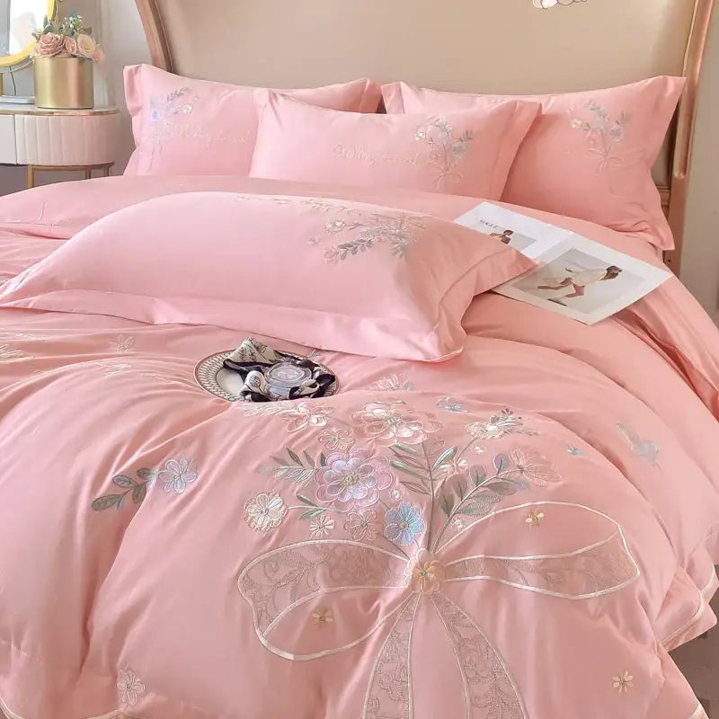 Pink satin bedding set with intricate silver and gold floral embroidery from decorbites chic flowers embroidery collection 100% cotton 400tc