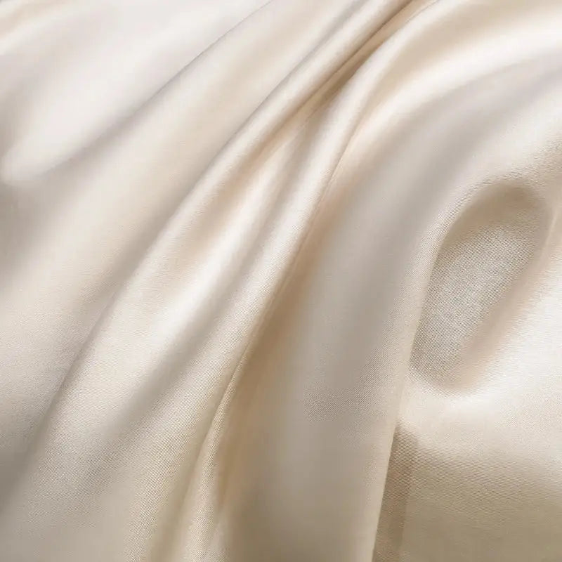 Cream-colored satin fabric with smooth glossy folds in decorbites chic flowers embroidery luxury bedding set 1000tc cotton