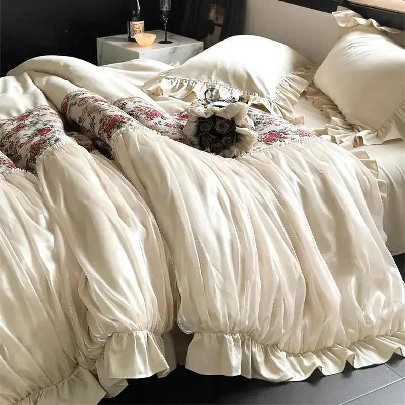 Cream-colored satin duvet cover with ruffled edges and floral pillowcases in decorbites chic flowers jacquard bedding set