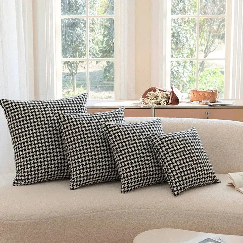 Set of four decorbites chic houndstooth cushion covers featuring black and white square weave for modern home decor
