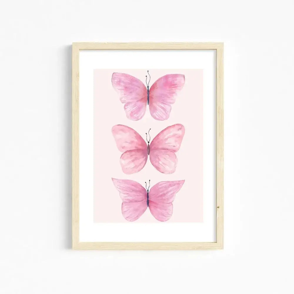 DecorBites™ chic pink wall art featuring three pink butterflies in a light wood frame for girls room wall art