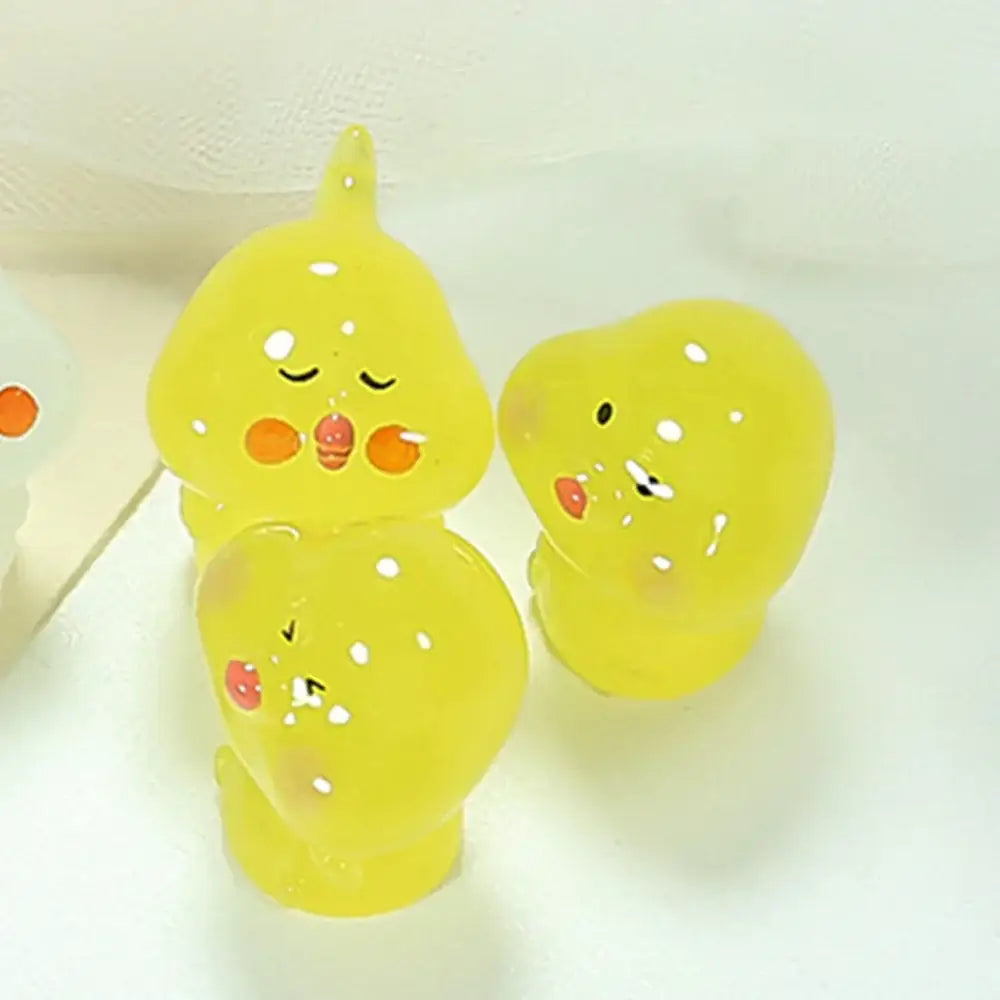 Yellow translucent resin decorbites chick doll figurines with white dot accents and cute facial expressions for miniature decor