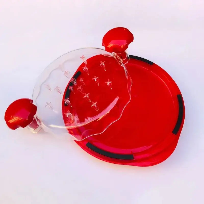DecorBites chicken shredder with clear lid and ergonomic red and clear plastic cactus-shaped handle with black grips