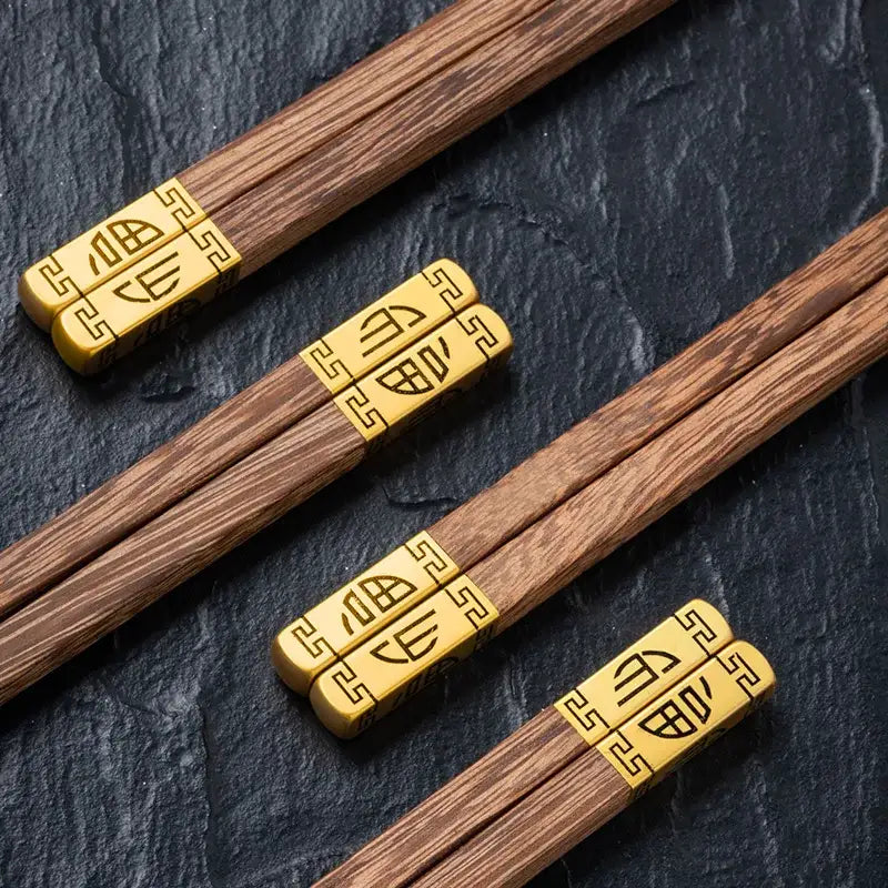 Decorbites™ chicken-wing wood chopsticks set with dark brown wood chopsticks featuring gold chinese characters and patterns