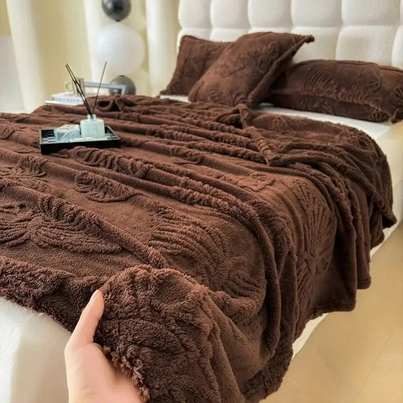 A plush chocolate-brown decorbites chiffon butterfly jacquard throw blanket with textured raised leaf pattern for couch or bed