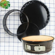 Black non-stick stainless steel decorbites chiffon cake mold with shiny textured rim and silver clasp mechanism