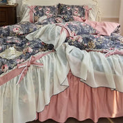 A layered ruffled bed skirt in soft pink and cream with floral patterns from decorbites chiffon lace ruffles bedding set
