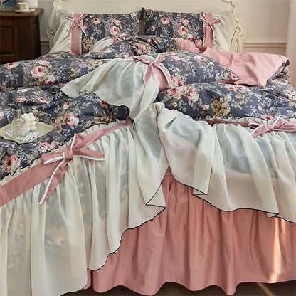 A layered ruffled bed skirt in soft pink and cream with floral patterns from decorbites chiffon lace ruffles bedding set