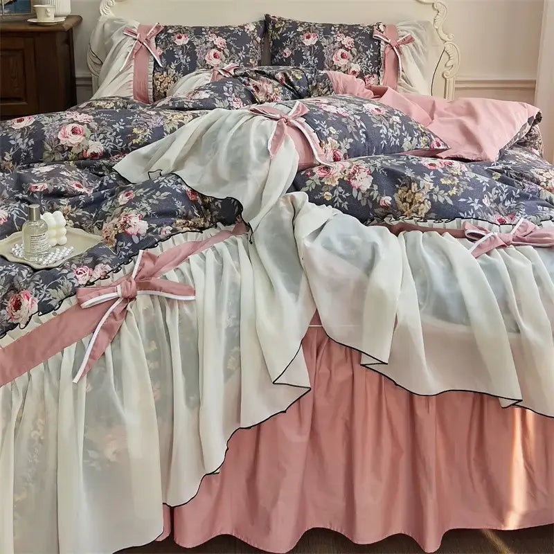 A layered ruffled bed skirt in soft pink and cream with floral patterns from decorbites chiffon lace ruffles bedding set