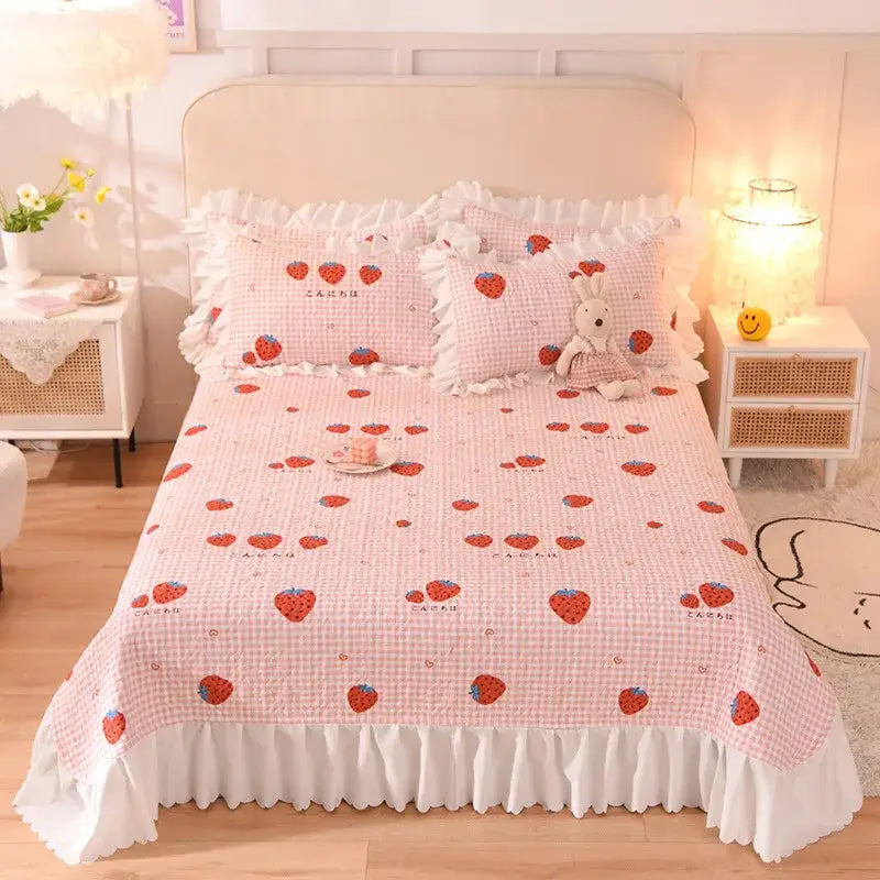 Pink strawberry-patterned decorbites chiffon quilted bed spread set with white ruffled edges and checkered background cotton queen size