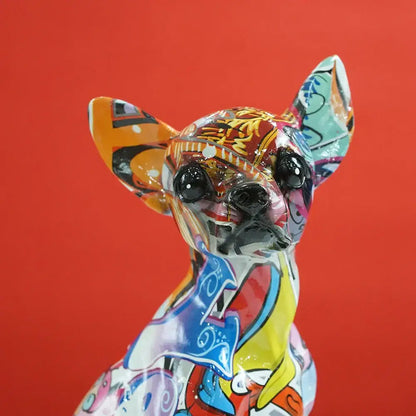 Vibrant glossy chihuahua dog resin sculpture with psychedelic pop art pattern in orange blue yellow and red by decorbites