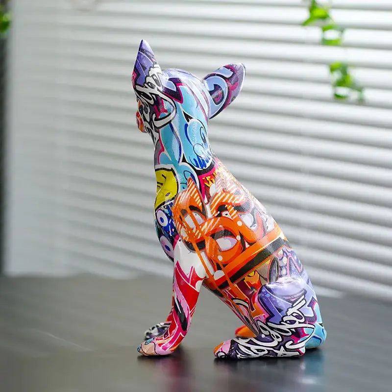Vibrant graffiti-style chihuahua dog resin sculpture with bold colors and urban art design for home decor