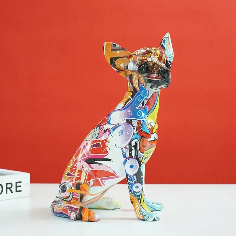Vibrant decorbites chihuahua dog sculpture with bold colorful abstract patterns and glossy resin finish for modern decor
