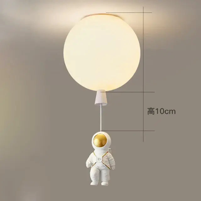 DecorBites children nordic bear astronaut ceiling chandelier features a white and gold astronaut figurine with LED lights