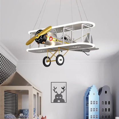 Decorbites™ children’s aircraft led chandelier shaped like a vintage silver biplane with gold propeller and landing gear