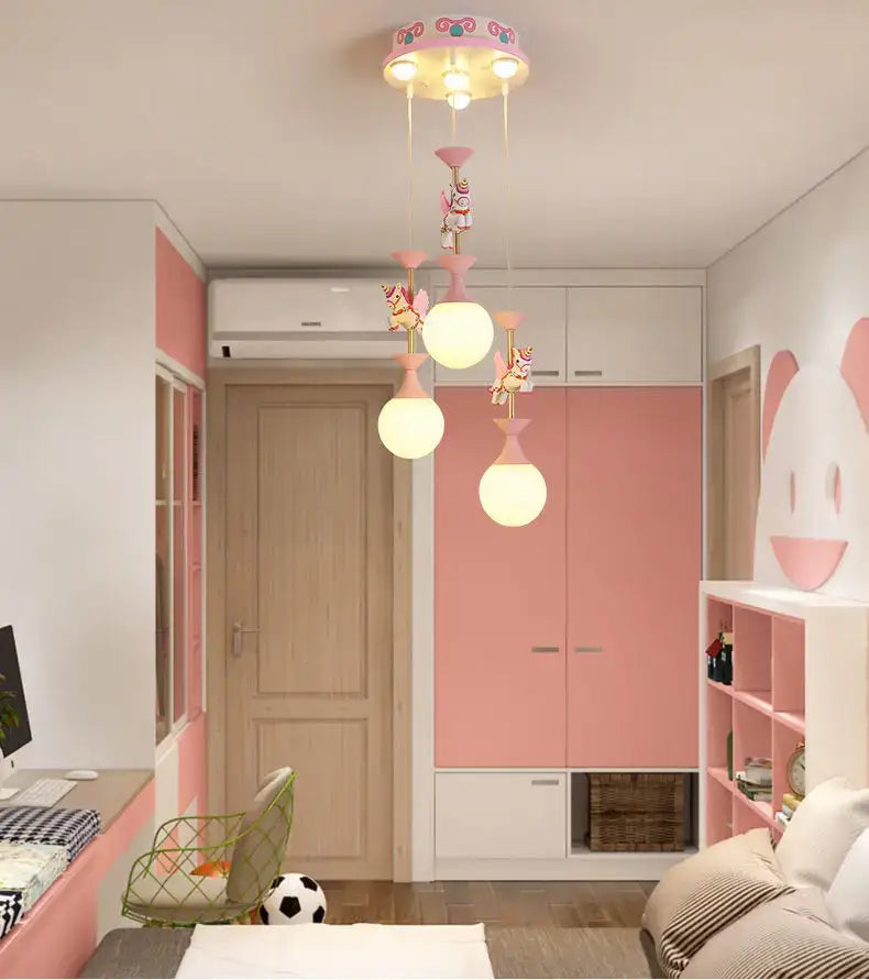Pink ceiling-mounted decorbites carousel led chandelier with unicorn figures and spherical glass shades for living room