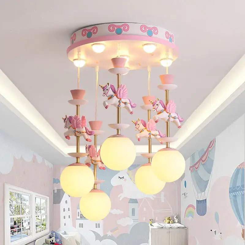 Decorbites™ children’s carousel led chandelier in pink and gold with spherical frosted glass shades for living room
