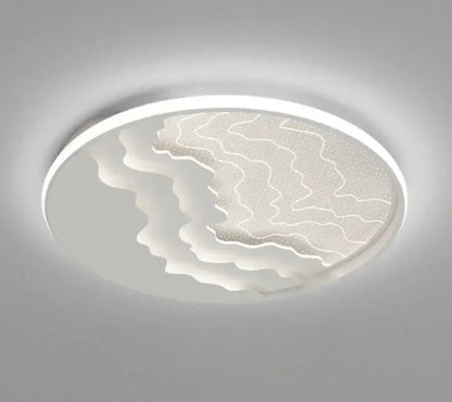 Modern white DecorBites™ children’s led ceiling lamp with sleek circular design and wavy translucent panels for nursery lighting