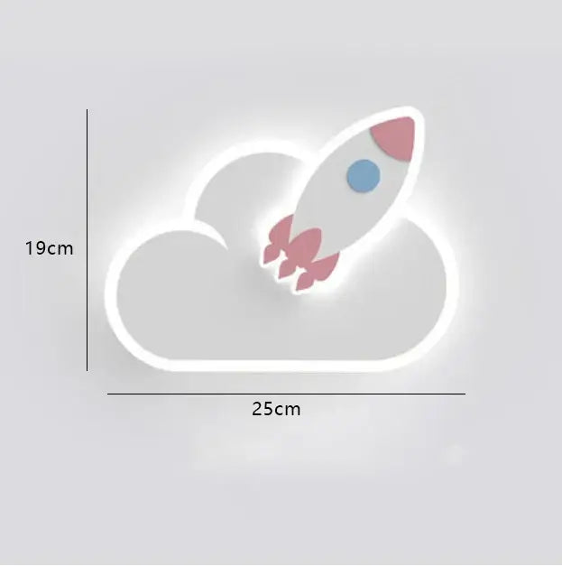 A glowing white led night light featuring a crown clouds rocket with pink fins on a cloud-shaped base for children