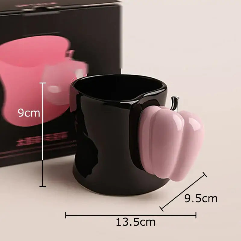Black ceramic porcelain coffee mug with pink pumpkin chili handle in decorbites chili handle cup design