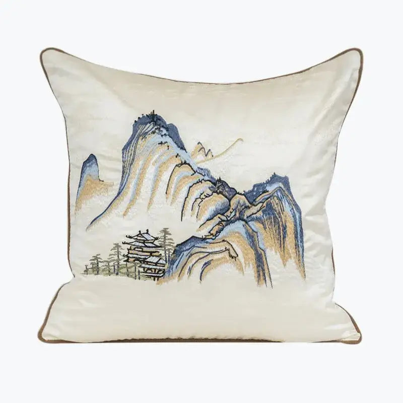 Cream-colored satin pillow cover with chinoiserie landscape embroidered in blue and beige by DecorBites™