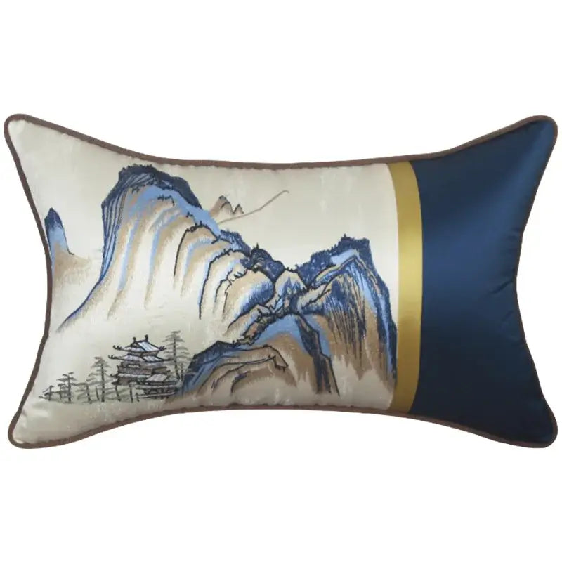 Rectangular pillow cover featuring chinoiserie landscape embroidered in blue and beige on cream with navy satin and gold trim