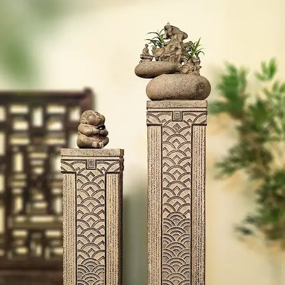 DecorBites™ stake display column with stone pillars, wave carvings, buddha figurine, and decorative rock garden greenery
